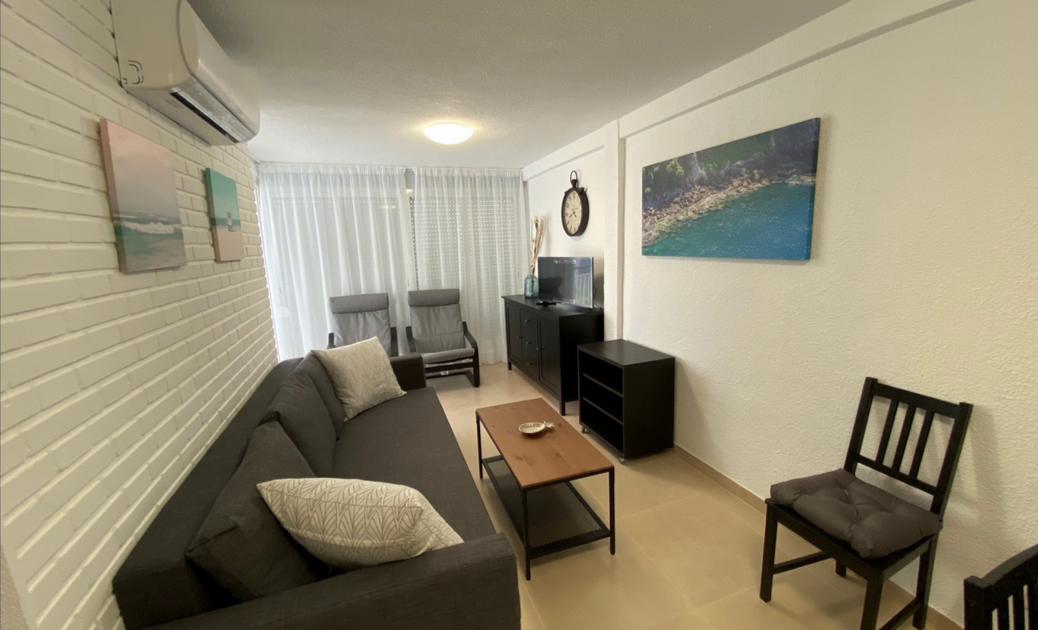 Fotografía del salón en un apartamento en el edificio Mar Blau en Benidorm
